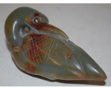 A Chinese carved russet jade bird