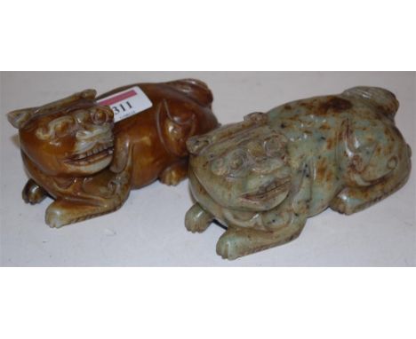 Two carved mid-20th century russett jade Shishi dogs (2) 