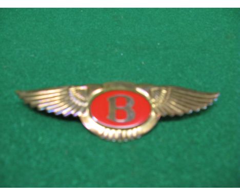 Bentley badge, copper coloured wings with red enamel surrounding the B - 6.5" wide