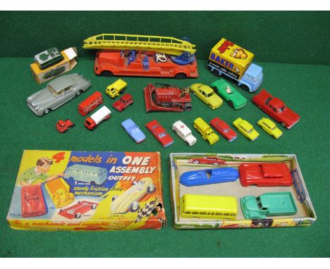 A 4 Model Vehicles In One Assembly Outfit, boxed, plastic and tin bakers lorry, a Casdon Product fire engine, Tat plastic Rol