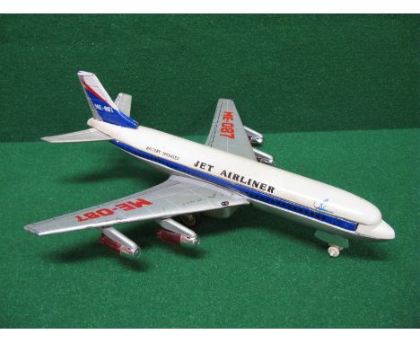 Battery powered tinplate four engine jet airliner ME-087 - 18" wing span