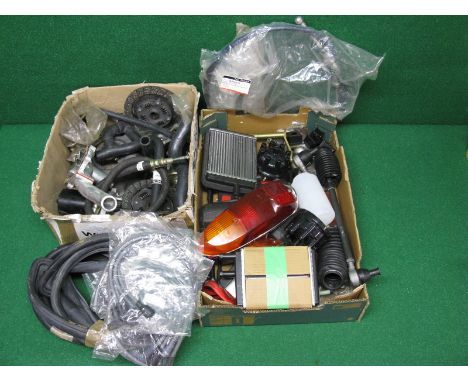 Two boxes of new old stock spares for MG/Rover and BMC cars from the 1970's, 1980's and 1990's to include rear light unit, do