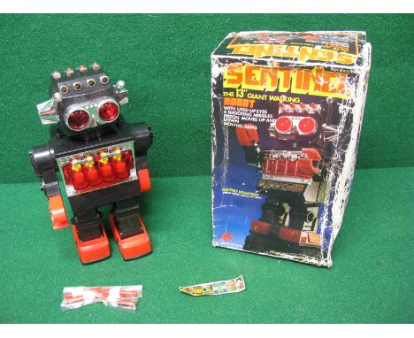 Kamco, boxed made in China 13" Sentinel battery powered walking robot with movement, lights, pistons and firing rockets (incl