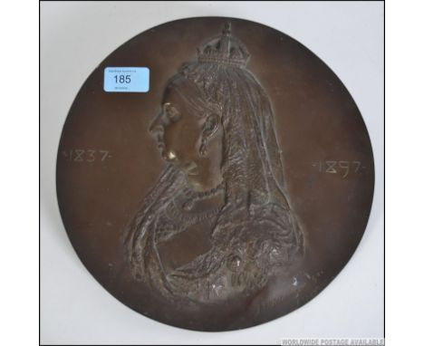 F. Williamson, Esher . A 19th century circular bronze plaque of large form in commemoration of Queen Victoria bearing dates o