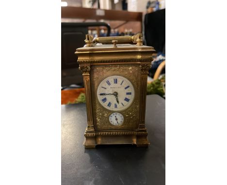 GILT FRENCH CARRIAGE CLOCK - RALPH & CO There is no damage to the glass as far as we are aware.We have added a photo of the c