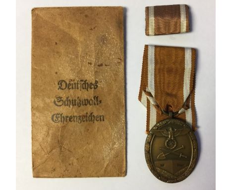 WW2 Third Reich Deutsches Schutzwall-Ehrenzeichen.&nbsp;West Wall Medal. Early Tombak example. Complete with original ribbon,