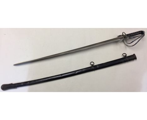 British Army Officers Sword with 770mm long fullered, single edged blade with VR etched decoration. Maker marked "Hawkes and 