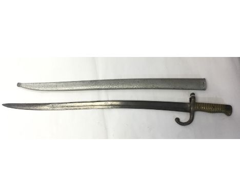 French 1866 pattern Chassepot Bayonet. Single edged fullered blade, dated 1869 to spine, measuring 57cm. Serial number to cro