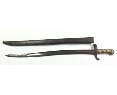 French Army 1842 pattern sword bayonet. 57cm long fullered single edged blade. Maker marked and dated to spine. Brass grip. W