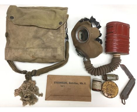 WW2 British Army Respirator No4 MkII with cloth covered face piece, dated 8/38 complete with filter, outfit anti dimming Mk V