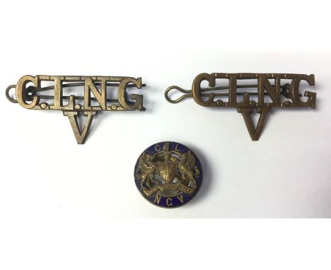 WW1 British brass shoulder titles for the City of London National Guard Volunteers. Both maker marked "Guant". Along with a C