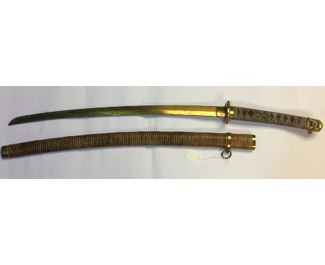 WW2 Imperial Japanese Officers Sword with 62cm blade. A hole has been drilled through the blade which has also been laquered.