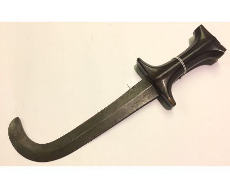 Middle Eastern Jambiya style dagger with double edged curved blade 18.5cm in length. Hard wood grip. No decoration. No markin