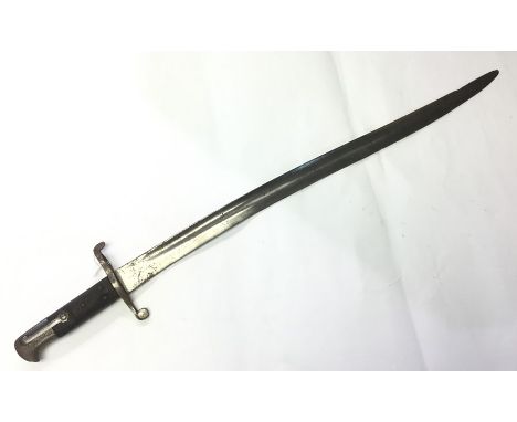 British Pattern 1856/58 Sword bayonet with fullered single edged blade approx 57cm in length. Unmarked. Overall length 70cm. 