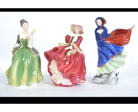 A collection of Royal Doulton ceramic figurines to include Fleur HN2368, May HN2746 & Top O' The Hill HN1834. Measures: 20cms