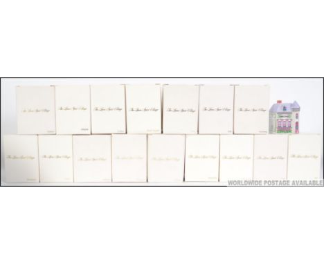 A collection of 19 collectable Spice Houses / Spice Village - Spice jars. Each ceramic house of a different design with notat