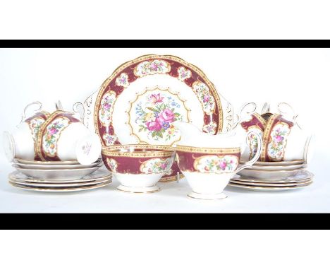 A six person China tea service by Royal Albert in the ' Lady Hamilton ' pattern. Comprising of six trio's, sugar bowl, milk j