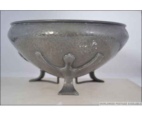 A circa 1907 believed Oliver Baker for Liberty's Tudric pewter bowl on three feet with cornelian cabouchons around the rim. S