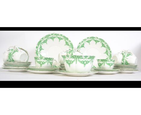 An early 20th century Foley china ceramic tea service in a green and white pattern, approx 12 piece setting