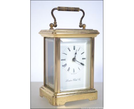 An early 20th century carriage clock having enamel facia with roman numeral chapter ring and faceted hands. Measures: 12cms h