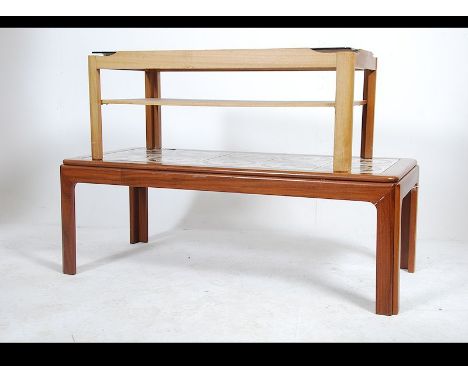 A retro 1970's tile top teak wood coffee table of rectangular form together with another Danish inspired teak wood coffee tab