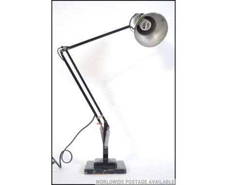 A vintage Herbert Terry 1228 model anglepoise desk lamp in original black paint. Terraced base with pendant shade. Measures: 