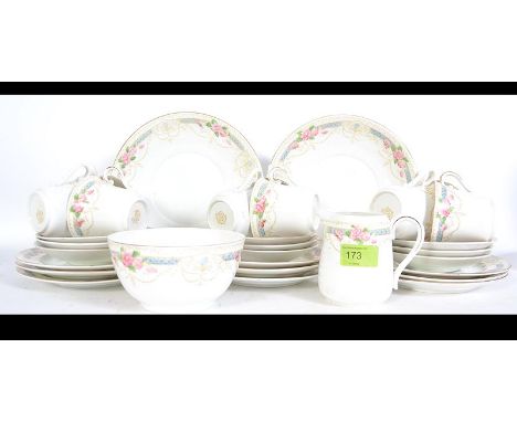 An early 20th century Heathcote china ' tyne ' pattern part tea service comprising cups, saucers, plates etc