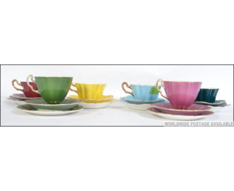 Four vintage Royal Stuart bone China trio's in different colours along with two other tea cups and saucers of similar style.