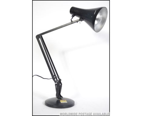 A vintage Herbert Terry  post war  anglepoise desk lamp in original black paint. Circular terraced base with pendant shade. M