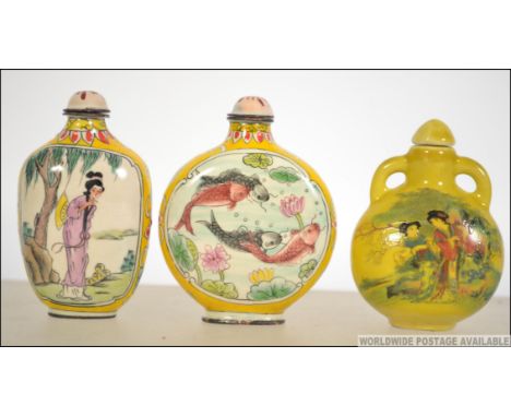 A collection of 3 ceramic and decorative Chinese famille rose perfume - snuff bottles, one of moon flask form. Each with scen