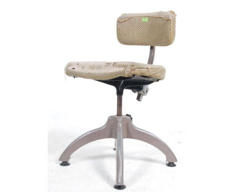 A vintage mid century Industrial office swivel chair with pad seat and back rest with painted grey quadruped base