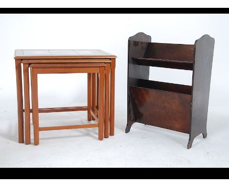 A 1970's retro G-Plan style teak wood and tile top coffee table with magazine rack to the underside. Measures: 40cms high x 5