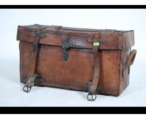 A vintage early 20th century military leather mule chest / ammunition chest. Constructed with high quality leather with hinge