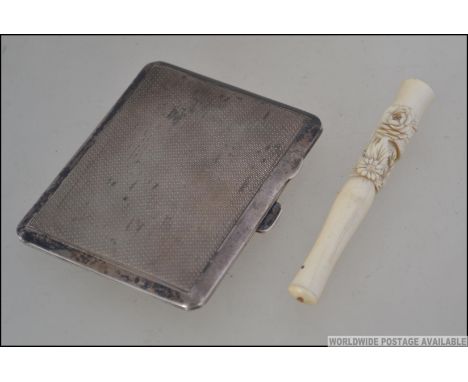 A silver hallmarked Cheroot / card case with hinged lid and engine turned design bearing assay mark for Birmingham, dating to