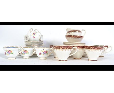 A really pretty PARAGON ' HONITON ' Tea service to include 6 cups and saucers , 6 side plates along with 2 large sandwich ser