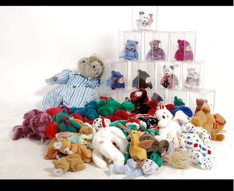 An extensive collection of Ty beanie baby soft toys to include believed early examples some in the glass original ty presenta