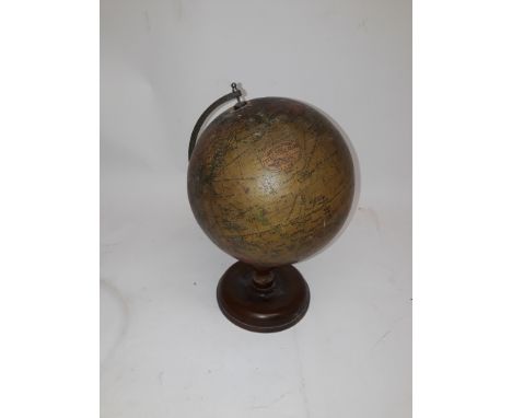 Vintage Geographia Terrestrial Globe, a pre war  8" globe on turned wooden stand by Geographia London, 33cm high, F 