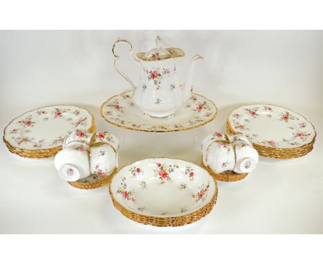 An extensive Royal Albert coffee and dinner service in the 'Tenderness' pattern,  to include eight cups, coffee pot, four bow
