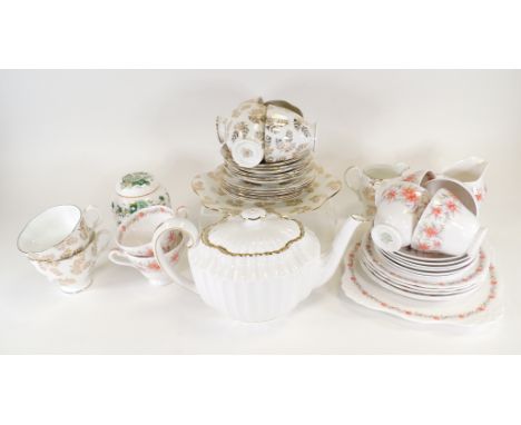 An eight piece Derby porcelain part tea set, of fluted form, decorated in gilt, the base with impressed Derby mark and hand p