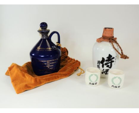 A Buchan stoneware whisky bottle,  from a limited edition of 2000, of which this is no. 376, with contents and seal in tact, 