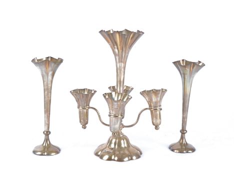 A c1900 London hallmarked silver epergne,  dated 1903, with four small fluted cups and one large and flared, raised on an oct