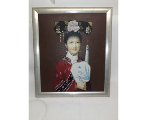 Chinese Oil Portrait Lady in Ceremonial Costume, an oil on canvas portrait of a young woman in floral silk robes wearing a Ma