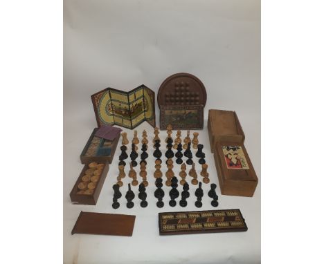 Vintage Chessman and Other Treen Games, two sets of wooden chessman one by Staunton, a 1920s compendium of games including me