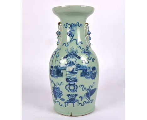 A Chinese 20th Century baluster vase with underglaze blue and white decoration,  the body with a design of an assemblage of p