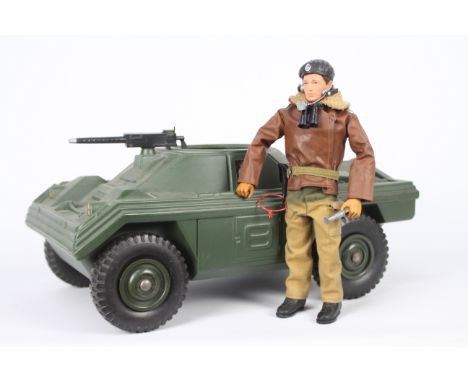 Palitoy, Action Man - A vintage brown flock hair Action Man figure in Tank Commander outfit, with unboxed Palitoy Scout Car. 