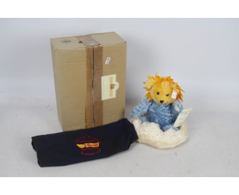 Steiff - A boxed white / blue mohair #00475 'Four Seasons Sun Beam 1997' - The bear has plastic eyes, wool felt paws and stit