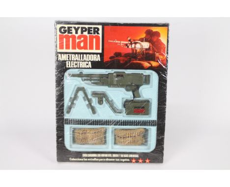 Geyper Man, Action Man - A boxed vintage Geyper Man Belt Fed Machine Gun 'Ametralladora Electrica'. The contents appear Mint 