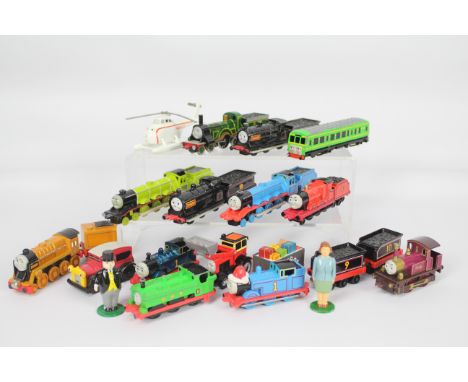 Thomas the Tank Engine - A mixed lot of mostly metal trains, including Thomas wearing a Christmas hat, Donald, Murdoch, Harol