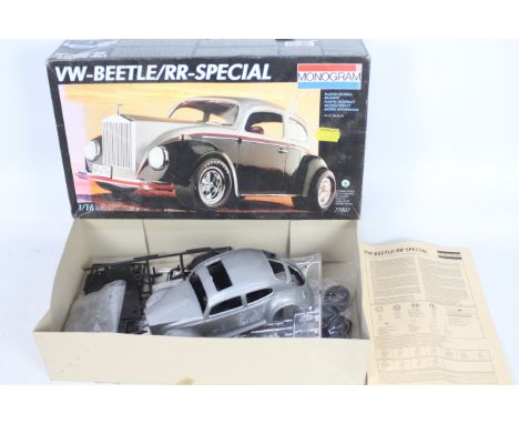 Monogram - A boxed 1:16 scale model car kit - Lot is a #77007 VW-Beetle/RR-Special. It also comes with the instruction manual