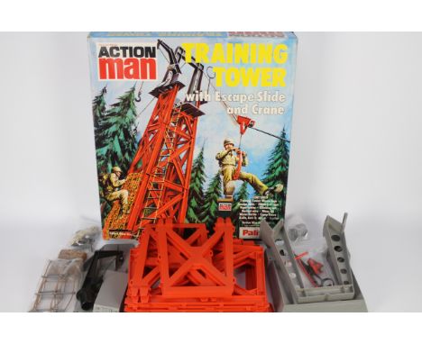 Palitoy, Action Man - A boxed Palitoy Action Man Training Tower with Escape Slide and Crane. The playset appears to be in Goo